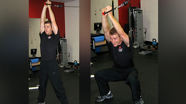 Cable overhead isometric hold and squat